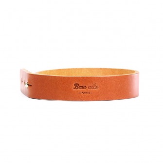 Brown leather bike pant strap